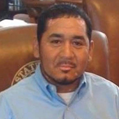 Robert speaking at a town hall