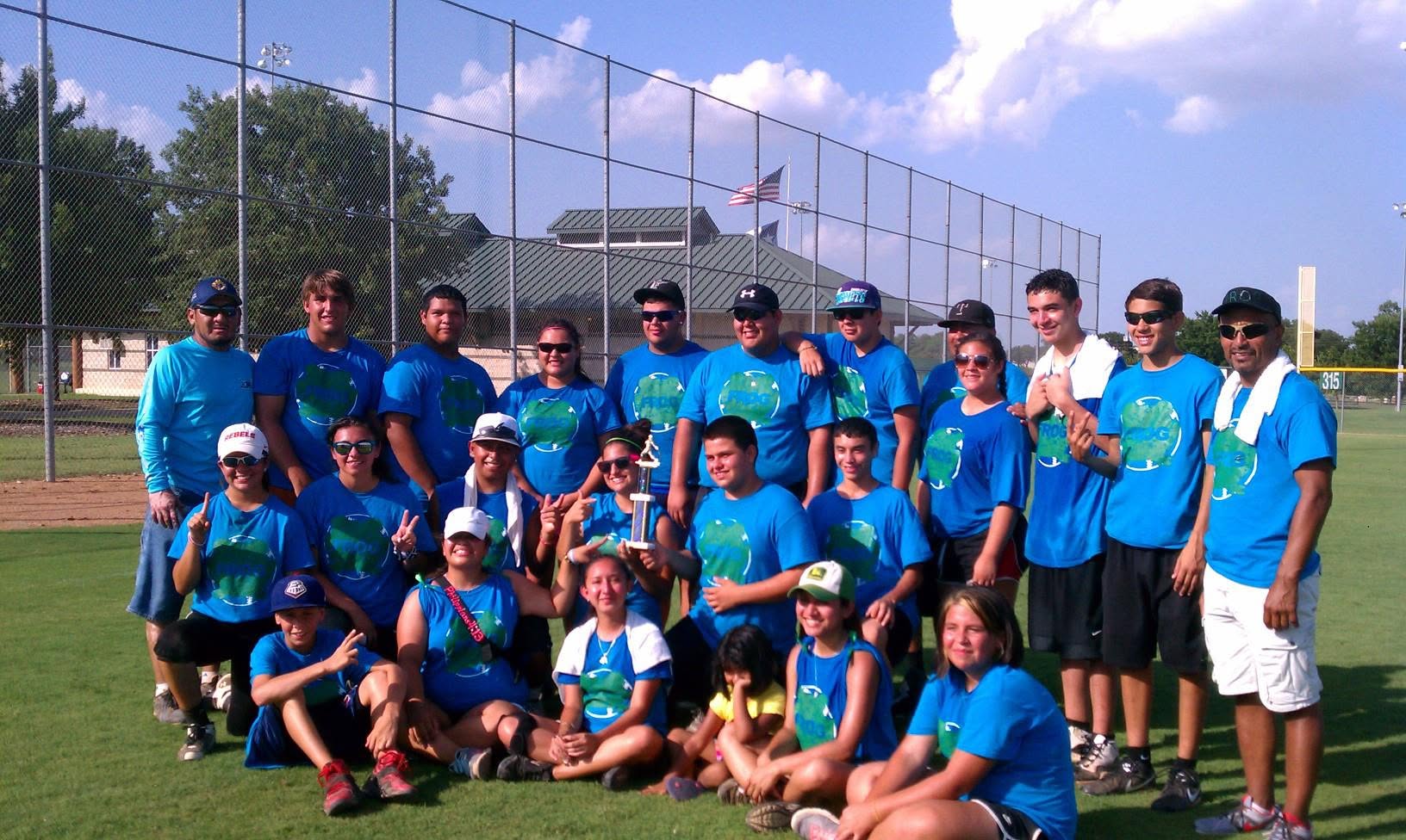 Robert Rizo with the St. Anthony's youth group softball team after their second-place finish at the Central Texas Catholic Youth Softball Tournament